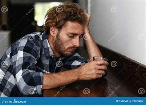 Depressed Young Man Drinking Alcohol In Bar Stock Image Image Of