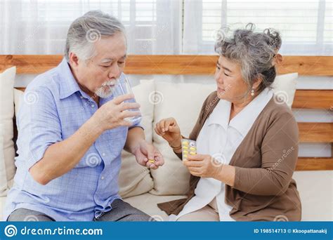 Man Caring For Sick Wife Son Helps Him Royalty Free Stock Photo