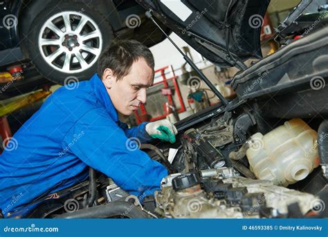 Auto Mechanic Repairman At Work Stock Image Image Of Garage