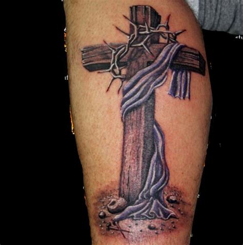 Learn about the story of cross tats and symbolism. Wooden cross tattoos | Tattoos of Crosses