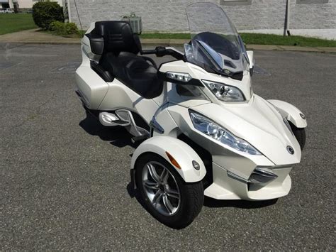 The vehicle has a single rear drive wheel and two wheels in front for steering, similar in layout to a modern snowmobile. 2011 Can-Am Spyder Roadster RT-Limited Sport for sale on ...