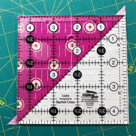 Trimming A Half Square Triangle With A Square Ruler The Quilters Planner