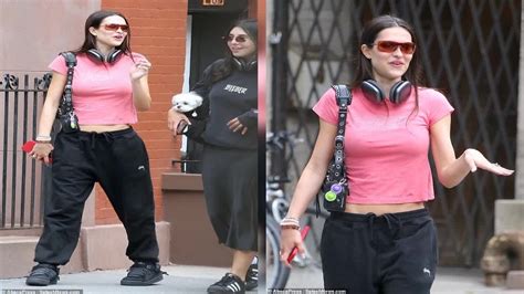 Amelia Gray Hamlin Flashes A Hint Of Her Toned Stomach In A Cropped Pink T Shirt As She Steps