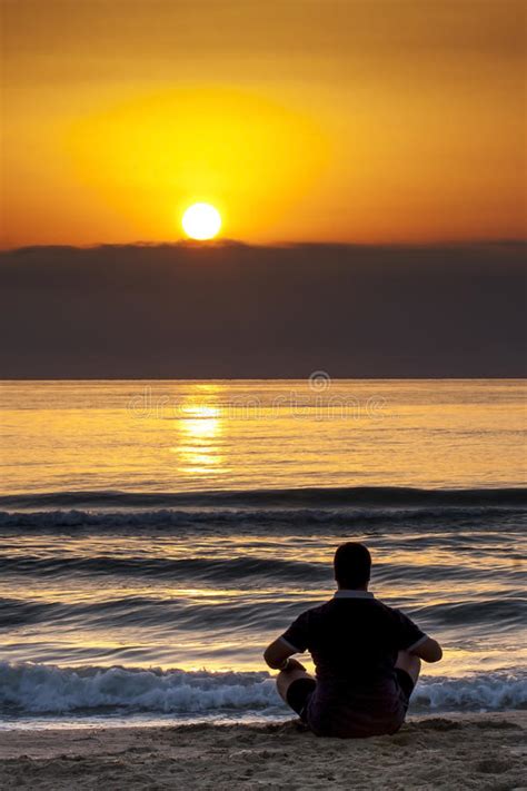 Man Sitting Sunrise Sunset Beach Contemplation Stock Image Image Of