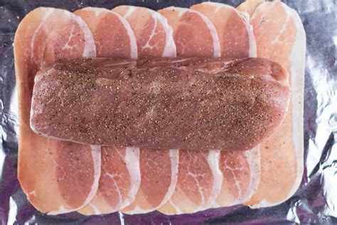 Remove the pork tenderloin from the oven and cover the roasting pan with aluminum foil. Prosciutto Wrapped Roasted Pork Tenderloin - A Cup Of Frosting