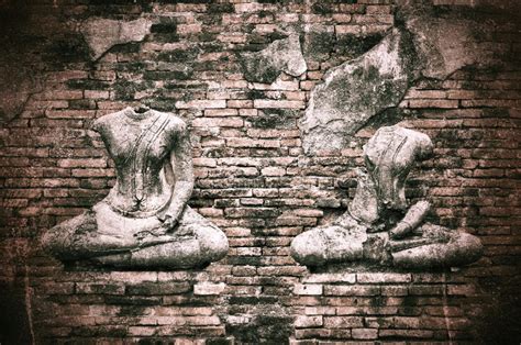 Old Broken Buddha Statue On Grunge Brick Wall Background With Vi Stock