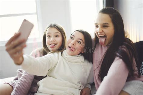 Teen Friends Girls With Smartphone Taking Selfie At Home Stock Image Image Of Together