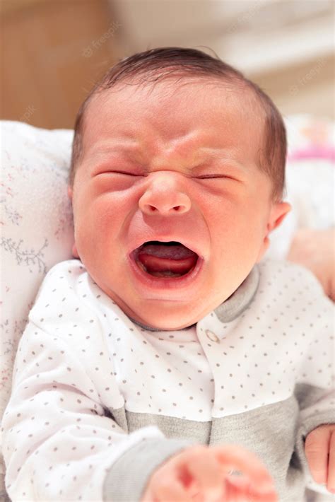 Premium Photo Cute New Born Baby Crying Loudly With Facial Gesture