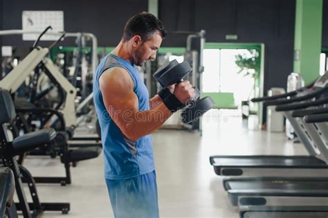 Man Doing Bicep Training In The Gym Stock Image Image Of Athlete