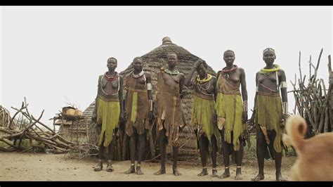 Toposa Tribe Women In Traditional Clothing In A Village Namorunyang