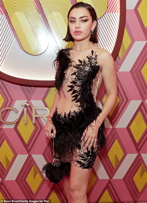 Charli Xcx Wows In Very Daring Black Feathered Mini Dress Daily Mail