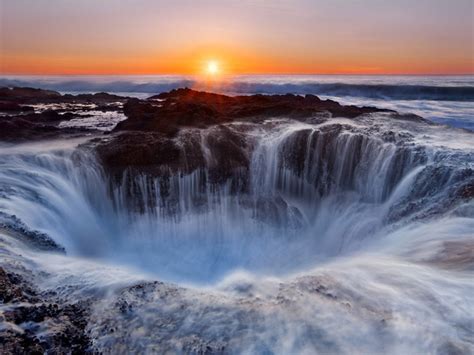 Crater Waterfall Sea Waves Sunset On The Horizon
