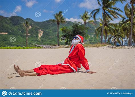 Santa Claus Relaxing On Sea Beach Christmas Or Happy New Year Concept Christmas In The