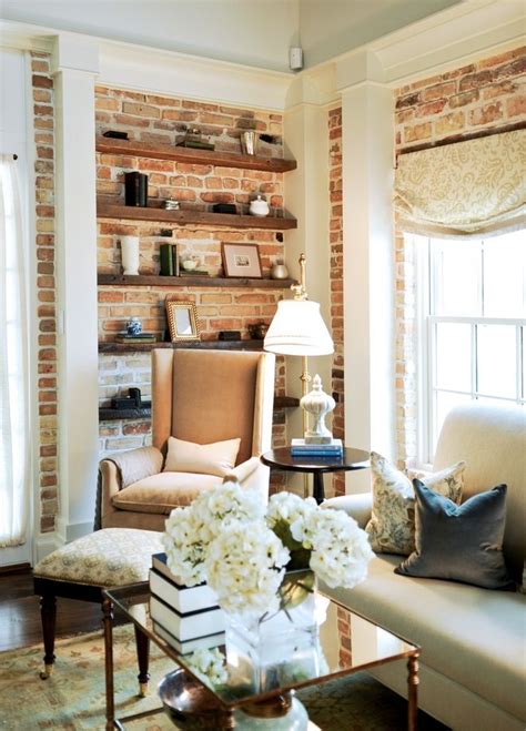 Mini Bookshelf With Exposed Brick Background In Charming Neutral Living