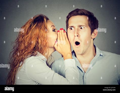 Amazed Shocked Man Listening Gossip A Secret In The Ear Stock Photo Alamy