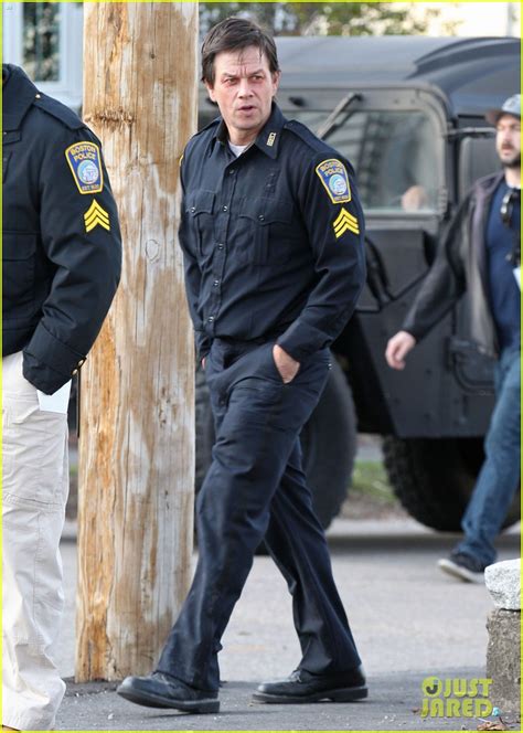 mark wahlberg sports two black eyes and police uniform for patriot s day filming in boston