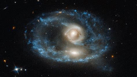 Some are fated to collide, like the milky way. New Picture of Twin Galaxy Collision Looks Like a Face ...