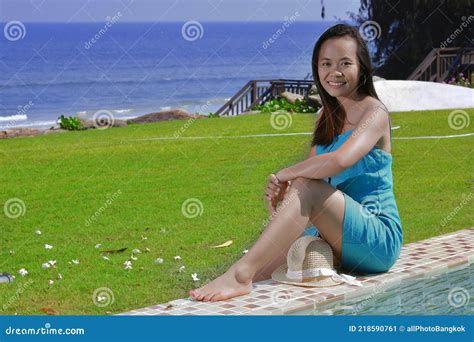 asian girl relaxing on a tropical beach stock image image of casual holiday 218590761