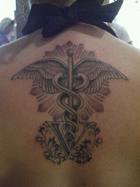 Veterinarian tattoo | Tattoos, Cover tattoo, Caduceus tattoo