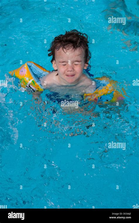 Young Boy Swimming Arm Bands High Resolution Stock Photography And