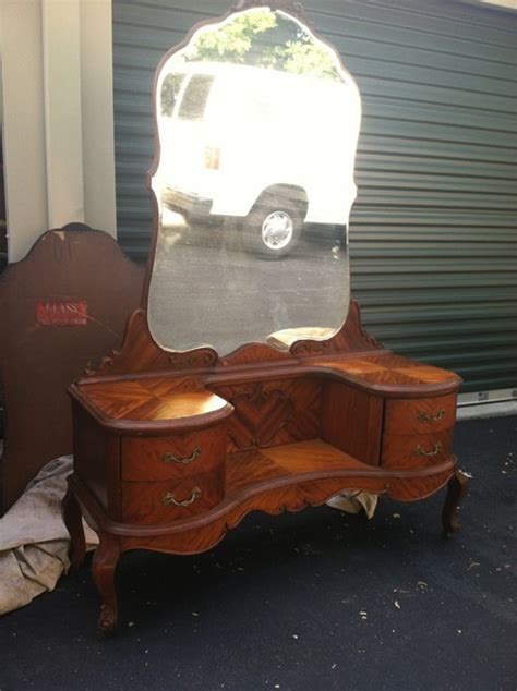 The inside is painted a gorgeous creamy color and papered. Antique Vanity makeup-mirrors