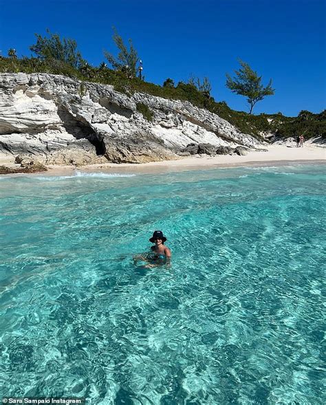 Sara Sampaio Dons A Tiny Blue Bikini As She Enjoys A Tropical Getaway