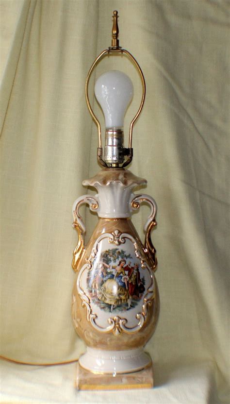 Vintage kerosene / oil lamps, including satin & art glass, gone with the wind, parlor, figural, cherub banquet, miniture night lamps, student, hanging prism libary & hall lamps. Porcelain Urn Style Victorian Rare Dancing Theme Electric ...