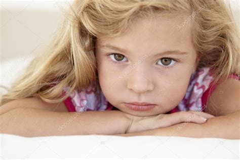 Young Girl Looking Sad Stock Photo By ©monkeybusiness 102711828