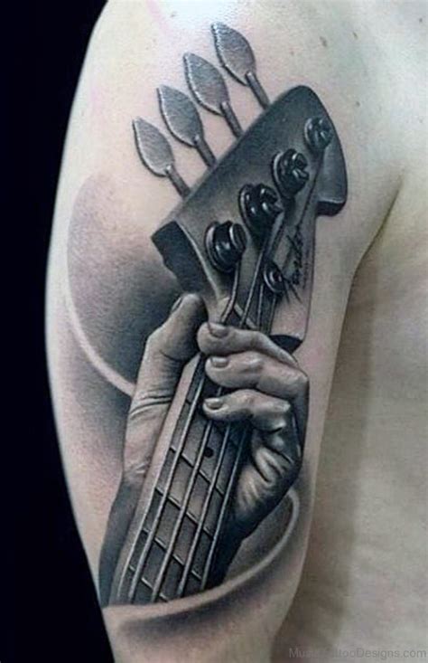 If you are into music, you can also add some music notes next to the guitar. 96 Best Music Tattoos