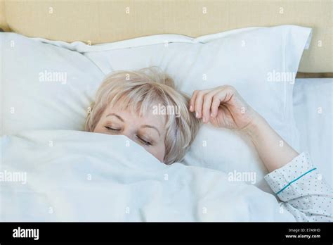 Comfortable Woman Sleeping In Bed Hi Res Stock Photography And Images