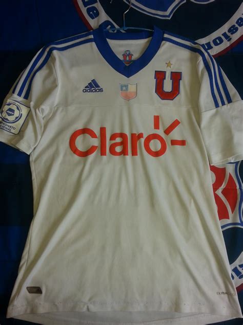 Plataforma de apoyo a la docencia presencial. Universidad de Chile Visitante Camiseta de Fútbol 2012.