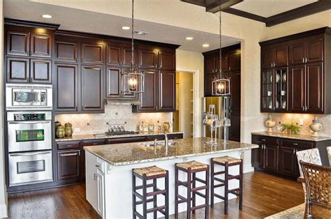 Dark brown kitchen cabinets with white island. Dark cabinets with white kitchen island (With images ...