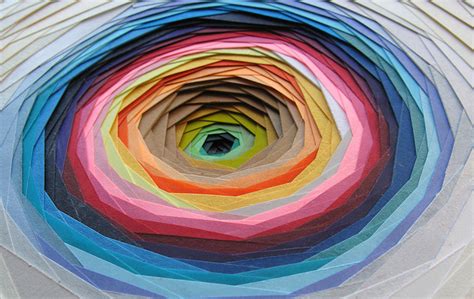 Colorful Layers Of Paper Form Intricate Sculptures And Patterns