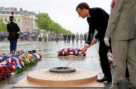 France Monde Macron Ravive La Flamme à Larc De Triomphe La