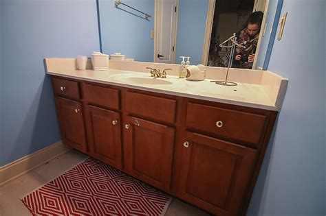 Refinishing cupboards with stain is a simple process. How to Refinish a Bathroom Vanity - Bower Power