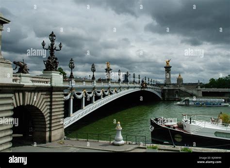 19th Century Deck Arch Bridge Pont Alexandre Iii Spans The Seine River