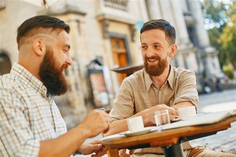Two Men Drink Coffee At A Cafe Stock Image Image Of Break Food
