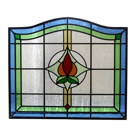 Authentic stained glass panels require lots of specialized tools, a fairly large workspace, and working with exposed glass edges. Arched 1930s Stained Glass Panel - From Period Home Style