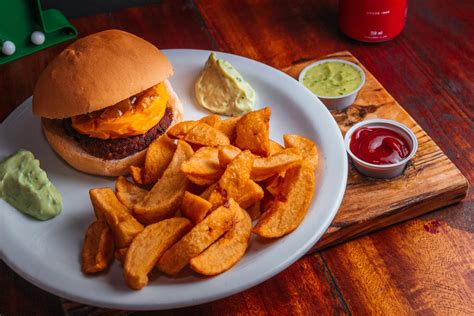 Burger And Fries On White Ceramic Plate · Free Stock Photo
