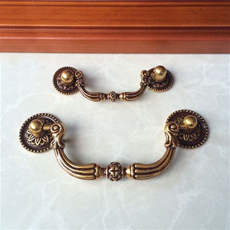 I had a dresser that wasn't reparable for dresser use. French Provincial Bail Style Drawer Pull Shabby Chic ...