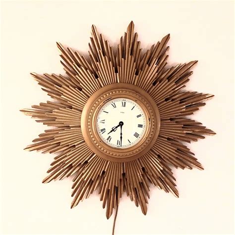 Choosing the right make an original sunburst clock is not always an easy process. Vintage sunburst electric clock by Metamec, 1950s | #124520