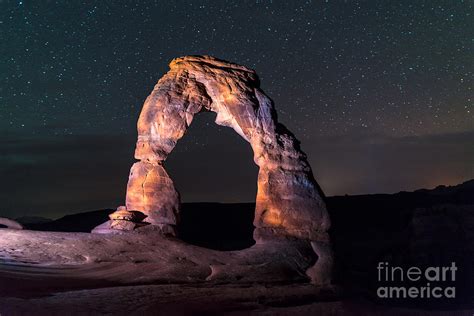 Delicate Arch At Night Against Beautiful Night Sky Photograph By