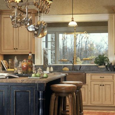 Natural wood cabinets may be the most durable and versatile options when shopping for cabinets, but they may not always be the best choice for you. pickled wood cabinets with grey counters | For the Home ...