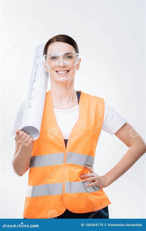 Happy Female Engineer Estimating Plan Stock Photo Image Of Blueprint