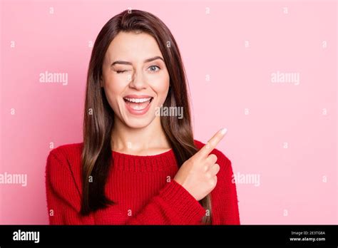 Photo Portrait Of Funny Pretty Woman Blinking With One Eye Smiling