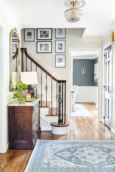 A Foyer Gets A Classic Timeless Yet Modern Update Using A Blend Of