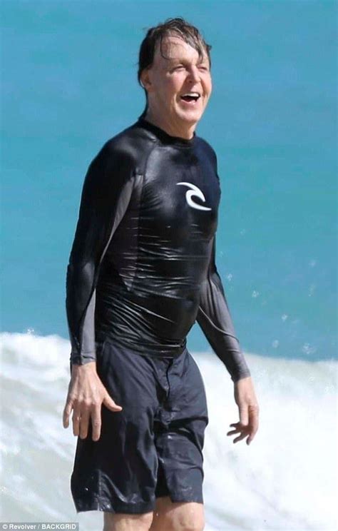 Twist And Splash Sir Paul Mccartney Was In High Spirits As He Hit The Beach With His Glamorous