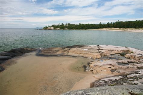We walked across the sandbar to see bathtub island. Bathtub Island - A hidden gem in Lake Superior Provincial ...