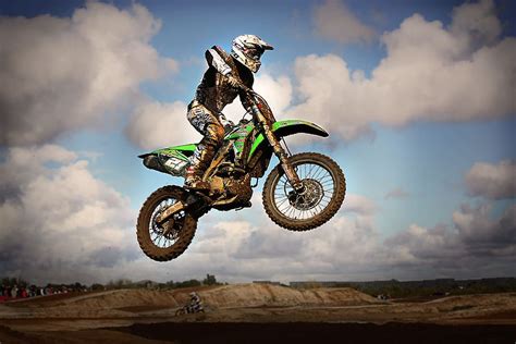 All things considered, it is the most exhilarating sport to do on foot or on a motorcycle. HD wallpaper: man riding motocross dirt bike, jump ...