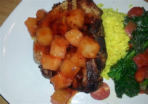 It has two different kinds of meat on it, with loin meat on one side, and tenderloin meat on the other side. Grilled center cut pork chop with sweet&sour pineapples, saffron rice and garlic spinach tomato ...
